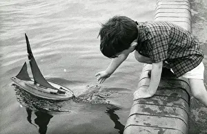 Ripples: Boy with model sailing boat, St Anne's, Lancashire