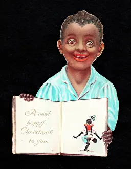 Leapfrog: Boy with an open book on a cutout Christmas card