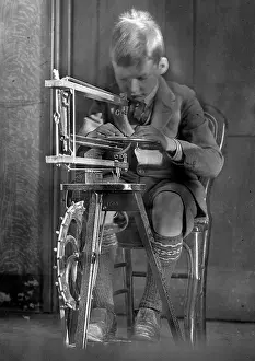 Treadle: Boy operating a fretsaw