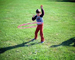 Twirl: Boy Playing with Hula Hoop