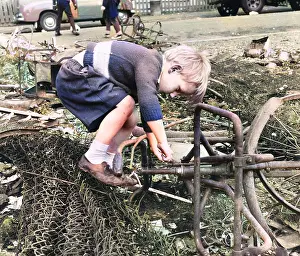 Junk: Boy playing with junk, Balham, SW London