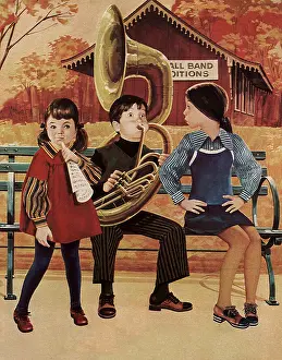 Playtime: Boy plays Tuba for two Girls
