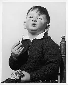 Misbehaviour: BOY PRETENDS TO SMOKE