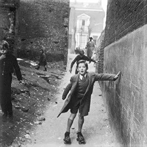 Steadies: Boy on roller skates, Harrow Road area