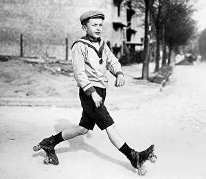 Skates: A boy roller skating in Berlin, 1910