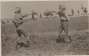 Epee: Two boy scouts fencing at camp