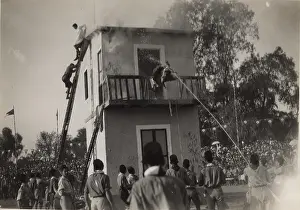 Ladders: Boy scouts practising firefighting, Egypt