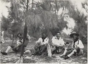 Mauritius: Boy scouts relaxing under a tree, Mauritius