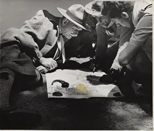Directions: Boy scouts studying a map, Athens, Greece