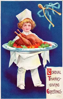 Wishbone: Boy serving a roast turkey on a Thanksgiving postcard