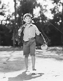 Whistling: Boy in short pants whistling
