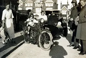 Bystander: Boy sitting on a 1918 Harley Davidson motorcycle