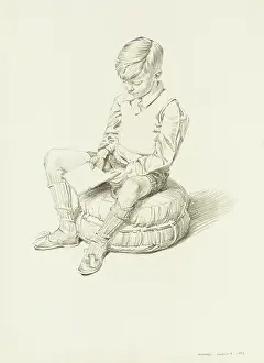 Pouffe: Boy sitting and reading