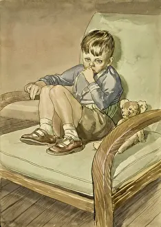 Sulking: Boy sitting with his teddy bear