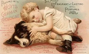 Canines: Boy snuggles with Dog