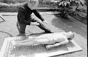Stuntman: Boy stuntman on bed of nails