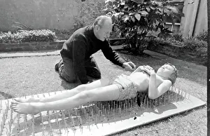 Stuntman: Boy stuntman on bed of nails