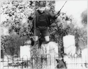 Swings: BOY ON A SWING