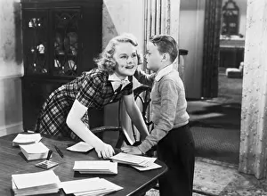 Envelopes: Boy telling secret to young woman
