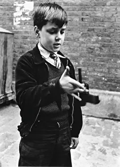 Corduroy: Boy with a toy gun, Addison Place