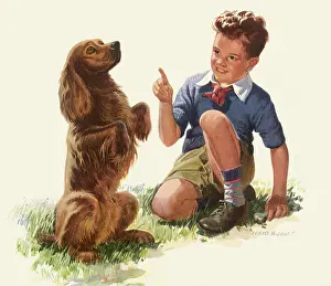 Obediently: Boy Training Dog