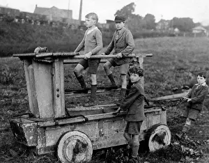 Newsome: Boys on an 18th century fire engine, Wirksworth