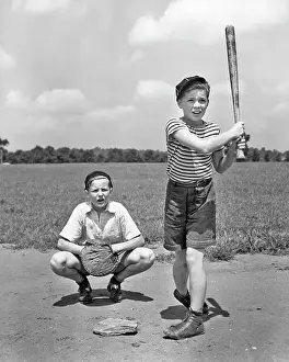 Sandlot: Two Boys Batter and Catcher Playing Sandlot Baseball