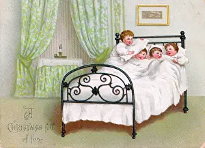 Victorian Christmas: Four boys in bed on a Christmas card