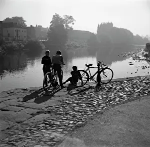 Bewdley: Boys with bikes by Bewdley Bridge
