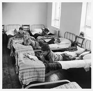 Boys in a boarding school dormitory