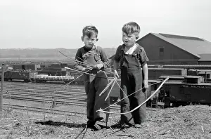 Dubuque: Boys - children - bows and arrows