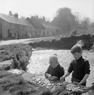 Bembridge: Boys collecting pottery pieces
