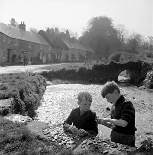 Barrington: Boys collecting pottery pieces