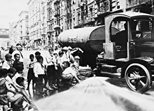 Splashed: Boys cool off in New York, 1925
