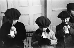 Straws: Boys drinking school milk