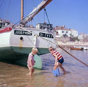 Teeshirts: Two boys in the harbour, St Ives, Cornwall
