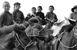 Gobi: Boys on their horses, North Gobi, Mongolia