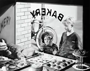 Ogling: Two Boys Looking in Bakery Shop Window at Desserts One Bo