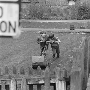 Lawnmower: Two Boys Mowing The Lawn