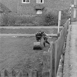 Lawnmower: Two Boys Mowing The Lawn