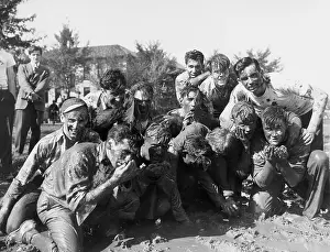 Filthy: Boys in muddy fraternity initiation