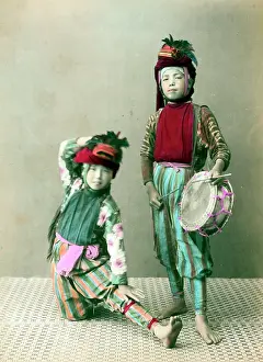 Acrobats: Two boys, musician and dancer - or acrobats