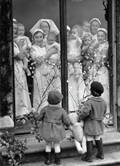Two boys in front of an orphanage