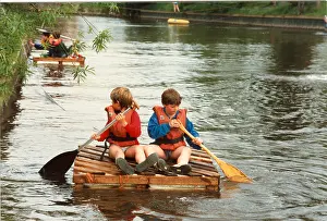 Lifejacket: Boys paddling a crate, Longridge Centre