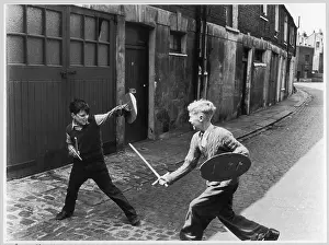 Addison: BOYS PLAY SWORD FIGHT