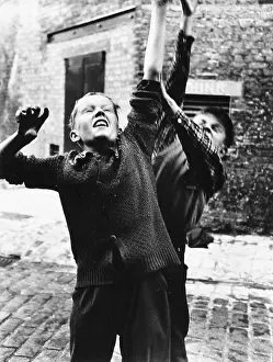 Addison: Two boys playing in Addison Place