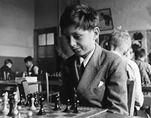 Contemplates: BOYS PLAYING CHESS