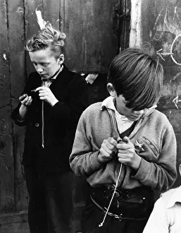 Threading: BOYS PLAYING CONKERS