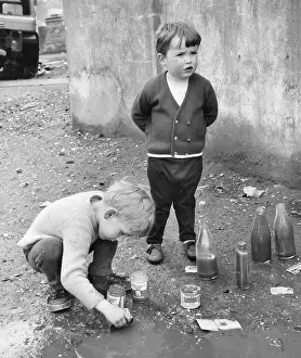 Gerber: Boys playing in a puddle, Balham, SW London