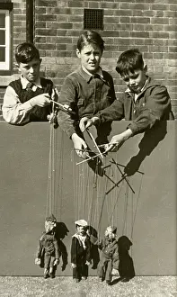 Marionnettes: Three Boys playing with Soldier Marionnettes